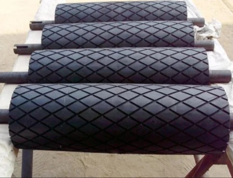 Grooved rollers for industrial applications